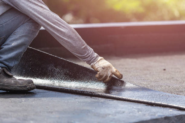 Professional Basement Waterproofing technician working in New Richmond, IN